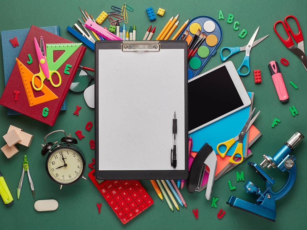Photo of a variety of common office supplies. 